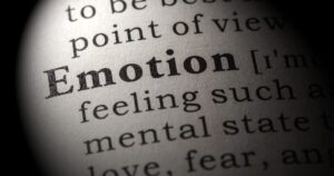 - Treat Mental Health Washington Close-up of the word 'Emotion' in a dictionary-style page, focusing on typography and printing detail, suggesting psychology or feelings.